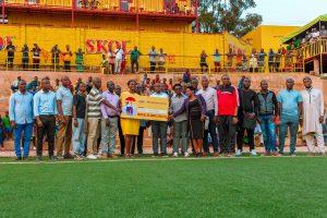 SKOL Brewery Ltd officially handed over the 2024-25 “Mutuel de Santé” health insurance to the Nzove Community.